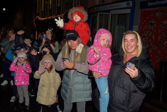 Families pictured at the Derry Christmas procession on Sunday evening last. Photo: George Sweeney. DER2248GS - 23 