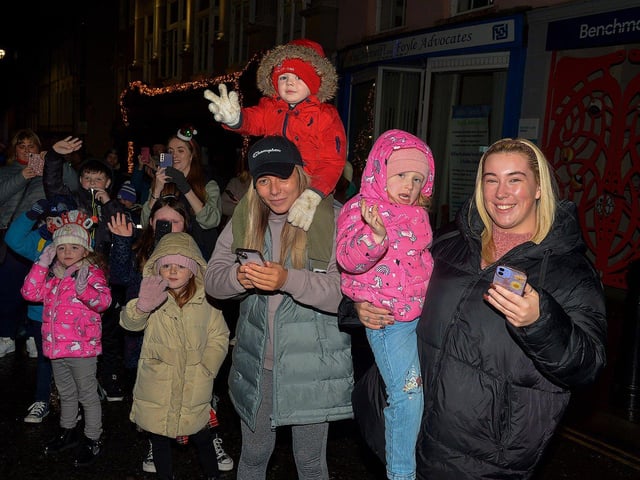 Families pictured at the Derry Christmas procession on Sunday evening last. Photo: George Sweeney. DER2248GS - 23