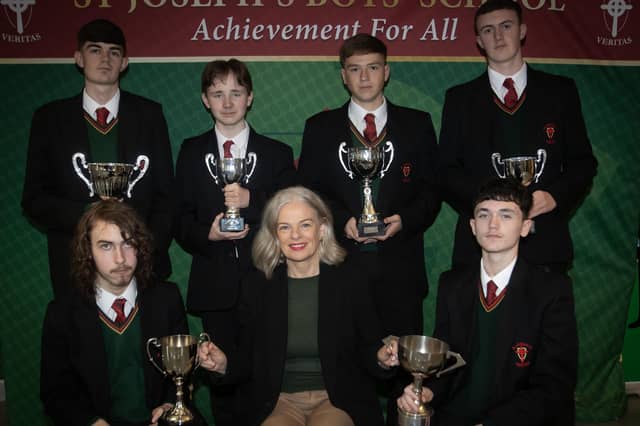 Mrs. Fiona Harrigan-Stewart, Vice Principal, St. Joseph's Boys School pictured with Year 11 Class Award winners at Thursday's Prizegiving. Front from left, Liam Dornan and Benn Tibbetts. Back from left, Elliot Shiels, Logan Roddy, Niall Starrs and Kian Fitzpatrick. (Photos: Jim McCafferty Photography) : .