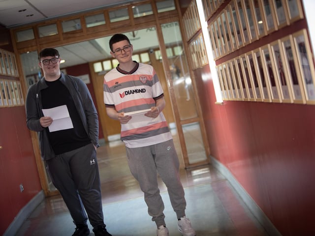Oliver Browse and Adam McKinney happy with GCSE results at St. Joseph's Boys School.