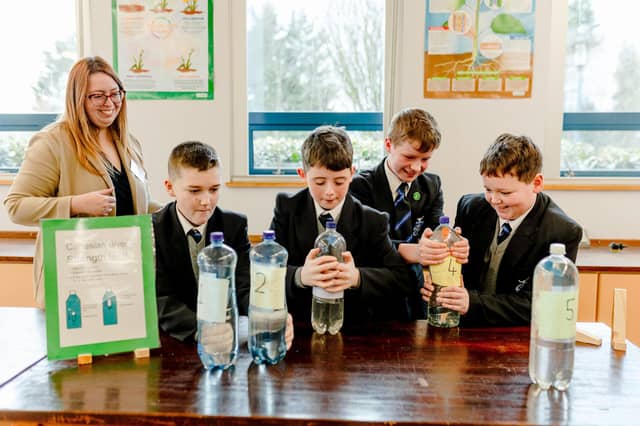 Pupils and staff in the science lab at St Columb;s College's Open Day.