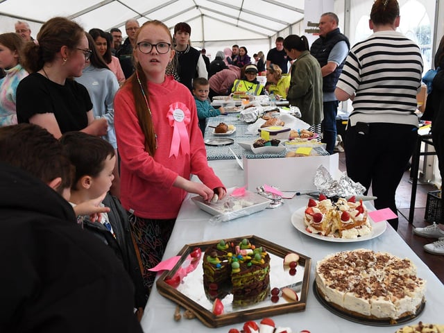 Sampling cake at the Muff Féile. Photo: George Sweeney