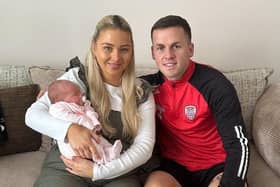 Derry City's Ben Doherty, his partner Shannon and their newborn baby daughter Enya.