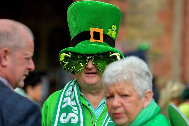 People enjoy the atmosphere at the St Patrick’s Day in Guildhall Square on Friday afternoon. Photo: George Sweeney. DER2311GS – 27