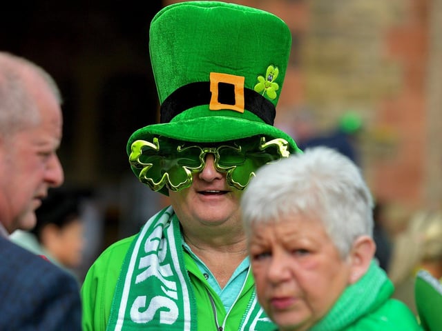 People enjoy the atmosphere at the St Patrick’s Day in Guildhall Square on Friday afternoon. Photo: George Sweeney. DER2311GS – 27