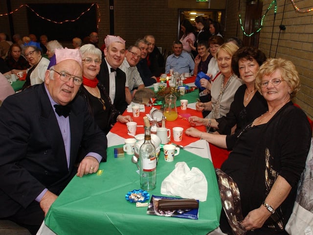 Group pictured enjoying the Pilots Row Christmas party. (0912PG23) :Christmas parties for Derry's senior citizens in December 2003