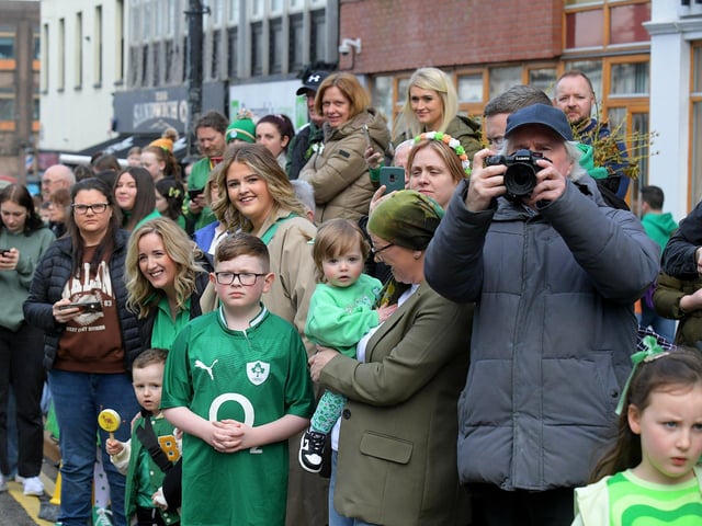 Watching the St Patrick’s Day parade. Photo: George Sweeney.