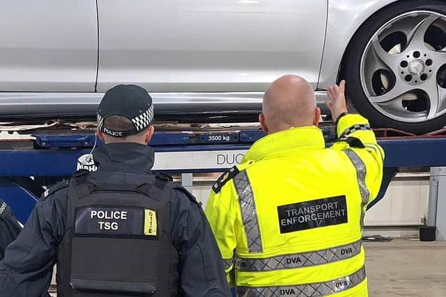 Police and DVA inspecting vehicles.