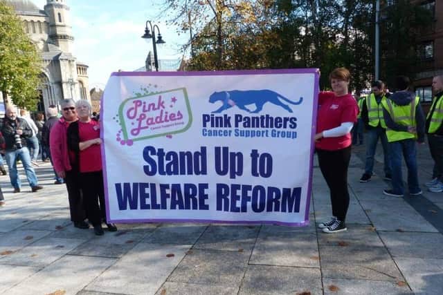 Pictured from left are Claire Cregan, Margaret Cassidy and Maureen Collins representing Pink Ladies at a benefits reform protest in Belfast.