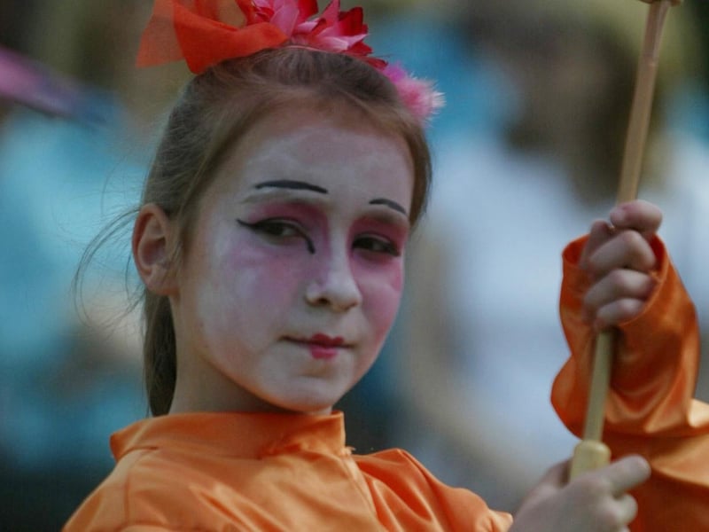 A geisha girl on parade during the carnival.  (0107JB68)