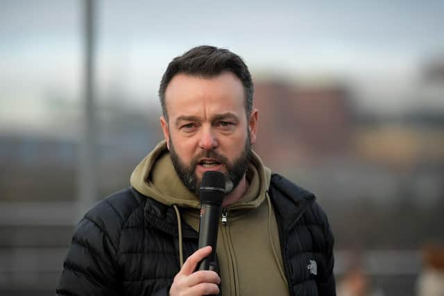 Colum Eastwood MP speaking at a recent march and rally, calling for a ceasefire in Gaza. Photo: George Sweeney