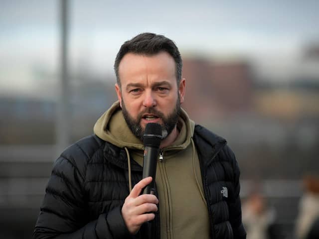Colum Eastwood MP speaking at a recent march and rally, calling for a ceasefire in Gaza. Photo: George Sweeney
