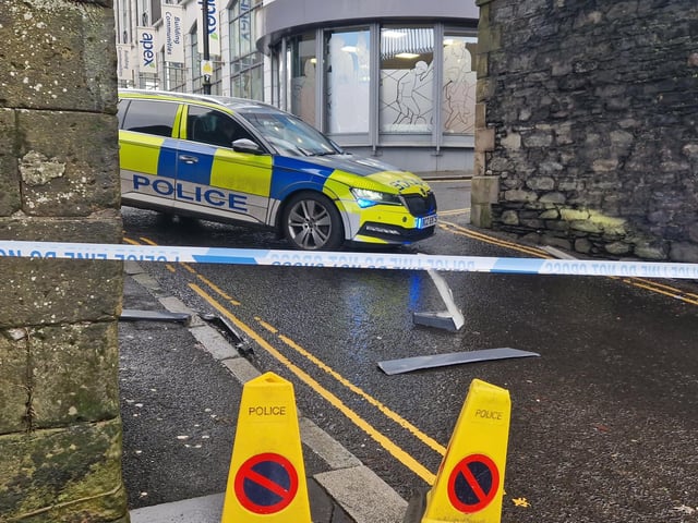 A police car blocks access to Butcher Street.