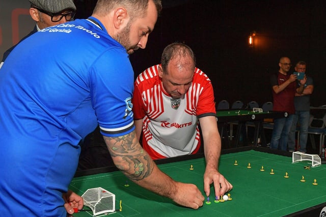 Dee Jenkins, Derry City Table Football Club, in action against an Italian opponent during the Subbuteo Irish Open held in the Nerve Centre. Photo: George Sweeney. DER2325GS - 114
