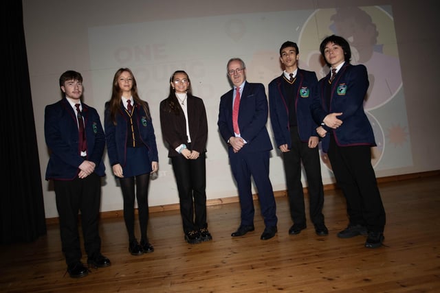 Mr. John Harkin, Principal, Oakgrove Integrated College pictured with guest speaker, Emer Rafferty, a delegate from the 'One Young World Summit 2023' who gave a talk to students from Oakgrove and Lisneal Colleges at the school. Included from left are Oakgrove students Daire Jackson, Ellie McMichael, Head Girl, Omar Musa and Martin Cassidy.