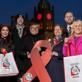 The Guildhall Clock in Londonderry has been illuminated red in support of World AIDS Day on 1 December. Supporting Northern Ireland’s only HIV dedicated charity Positive Life, are, (L-R), Cara Hunter MLA, Mark H. Durkan MLA, Jacquie Richardson, CEO Positive Life, Cllr Patricia Logue, Mayor of Derry City and Strabane District Council, Gary Middleton MLA, and Ciara Ferguson MLA.