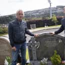 The Jam's guitarist/singer/songwriter Paul Weller pictured at the graveside of his late friend Eamon Friel during his visit to the city. On right is Eamon's son Colm. (Photos: Jim McCafferty Photography)