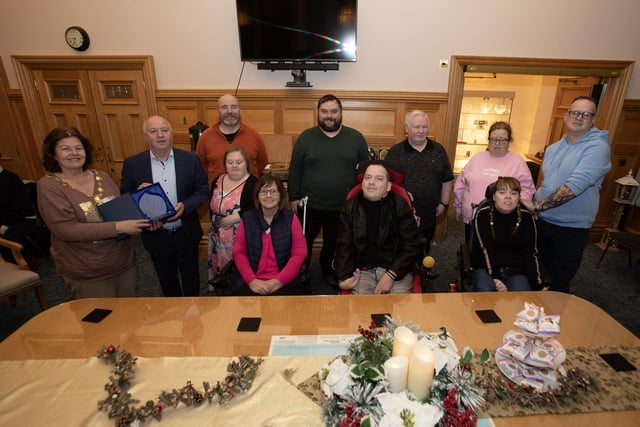 The Mayor, Patricia Logue making a presentation to Professor Frank Lyons, Ulster University, and the musicians from Acoustronics during Monday night's reception in the Guildhall to recognise their recent internationally-acclaimed success.
