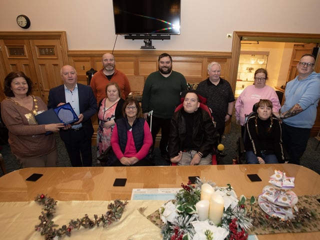 The Mayor, Patricia Logue making a presentation to Professor Frank Lyons, Ulster University, and the musicians from Acoustronics during Monday night's reception in the Guildhall to recognise their recent internationally-acclaimed success.