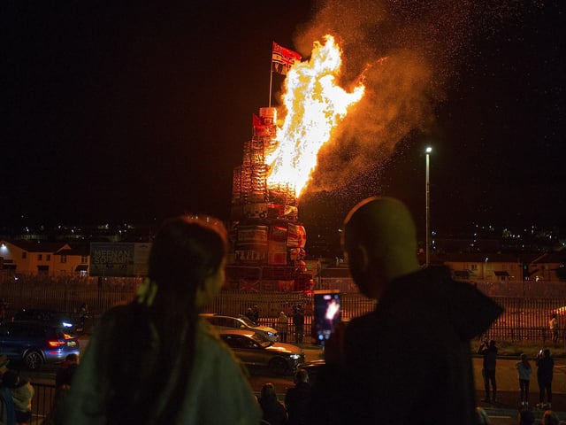 Bonfire alight in the Bogside on Thursday night. Photo: George Sweeney