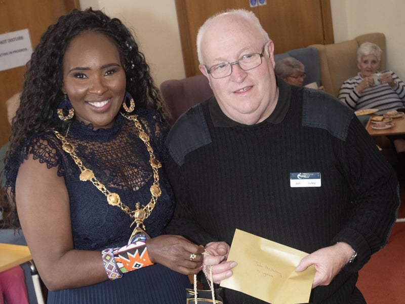 John McAuley being presented with an award from the Mayor, Lillian Seenoi-Barr for ten years service at Longfield Care Home on Thursday afternoon.