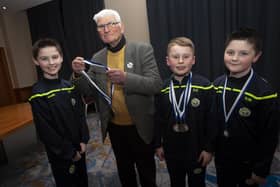 A couple of the young Sion Swifts players pictured with John ‘Jobby’ Crossan at Friday night’s D&D Youth Awards.