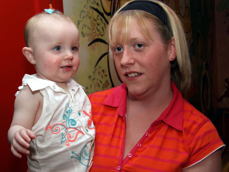 Birthday girl Kasey poses for a photograph with Godmother Karen 0538JML : Parties and celebrations June 2006: Casey McCourt.