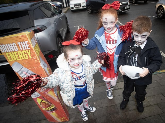 The Dawsons arrive at Nearby in Culmore for the Haunt Jaunt to Hollybush PS on Wednesday morning - all sporting some very impressive face paintings! : .