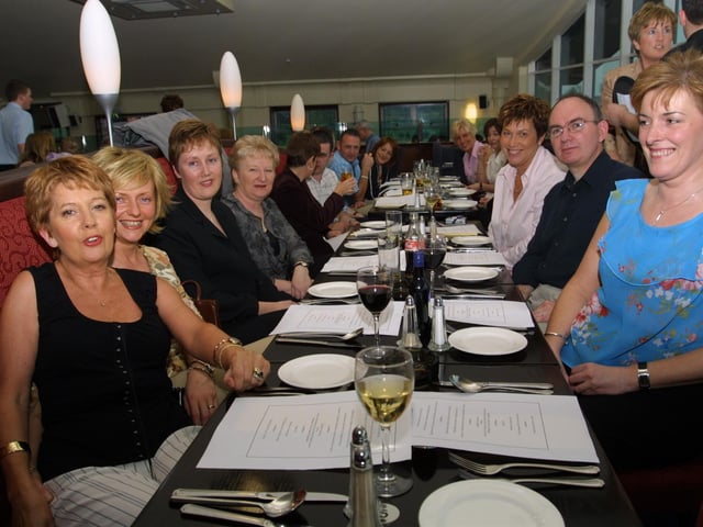 A group pictures at a function to mark Paddy McShane's leaving do. Pictured are Joan Aspel, Margaret Taggart, Gloria Killen, Yvonne Smith, Gillian McCorkell, Paul Smyth and Donna Gallagher