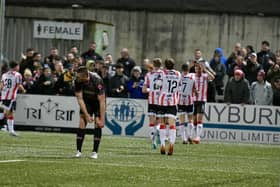 Will Patching celebrates with fellow goalscorer Michael Duffy as Derry City run riot against Dundalk. Photographs by Kevin Morrison.