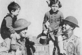 American GI's pictured in Derry with local Children