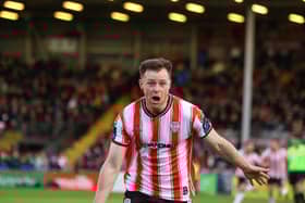 Grimsby Town bound Cameron McJannet celebrates Derry City's winner at Dalymount. Photograph by Kevin Moore.