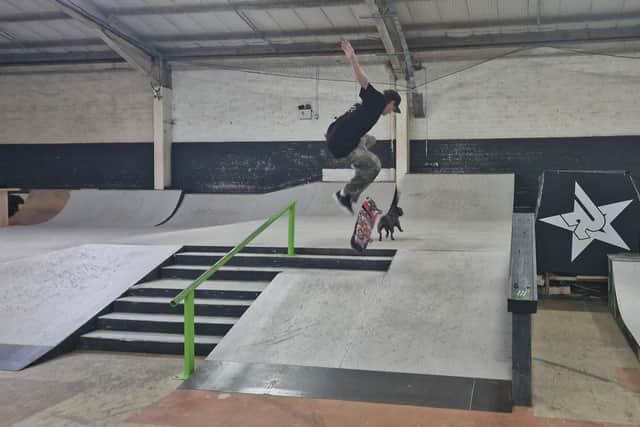Joe performing tricks in his skatepark.