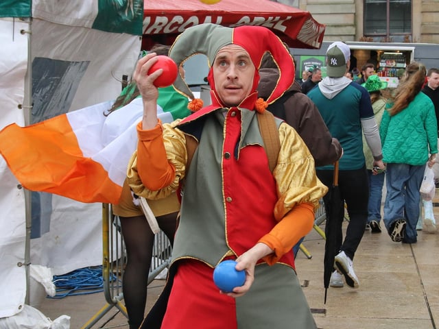 A juggler entertains on St. Patrick’s Day in the Guildhall Square. (Photo - Deirdre Heaney, nwpresspics)
