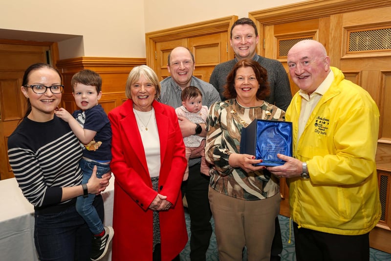 The Mayor of Derry and Strabane, Councillor Patricia Logue, presenting a civic gift to tour guide Garvin Kerr at a reception in the Guildhall on the occasion of his retirement after 18 years from Martin McCrossan City Tours. Included are Mrs. Marie Kerr, sons Emmet and Garvin, daughter-in-law Gemma and grand-children Oisin (3) and Clodagh (3months).
Credit ©Lorcan Doherty