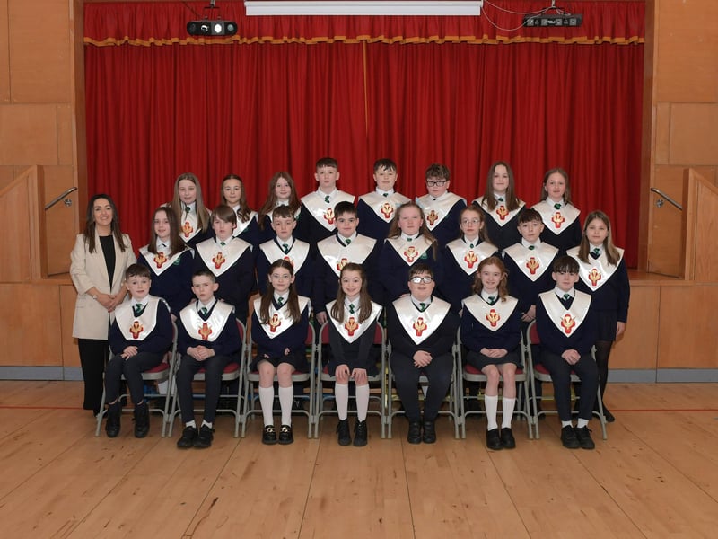 Pupils from St Patrick’s Primary School who recently made their Confirmation at St Patrick’s Church in Pennyburn. Included in the photograph is Mrs O. Callan (teacher). Photo: George Sweeney