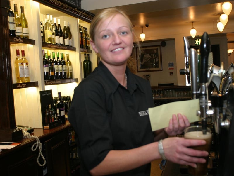 Pouring a pint in The Gallery in 2004