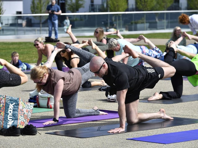 Participants at the Northlands Well Being Yoga event held in Ebrington Square on Saturday morning. The event was part of the Northlands 50th Anniversary Celebrations. Photo: George Sweeney