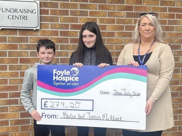 Brother and sister, Khloe and James McAteer, who recently sold a ewe and very kindly donated the money received to Foyle Hospice. They are pictured handing over a cheque for £279.20 to Ailbhe McDaid, Community Fundraiser, Foyle Hospice.