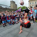 Tom Madden demonstrates his soccer skills, at Guildhall Square, during  the Foyle Cup City Centre parade.