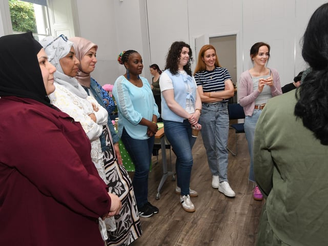 A section of those taking part in one of the workshops at the Creative Facilitator Training Workshop held by the Waterside Neighbourhood Partnership in St. Columb's Park House on Saturday last. : .