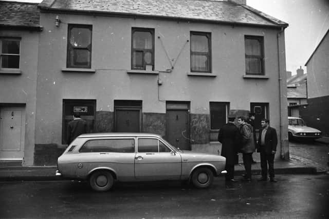 The exterior of Annie's Bar, the day after the massacre.
