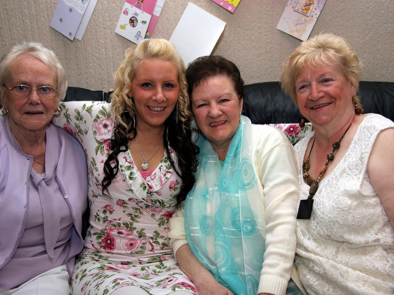 Amanda smiles for the camera with her grannies, Kathleen, Lily and Kathleen 0627JML