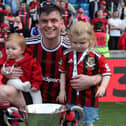 Philip Lowry celebrates winning the Irish Cup with his family