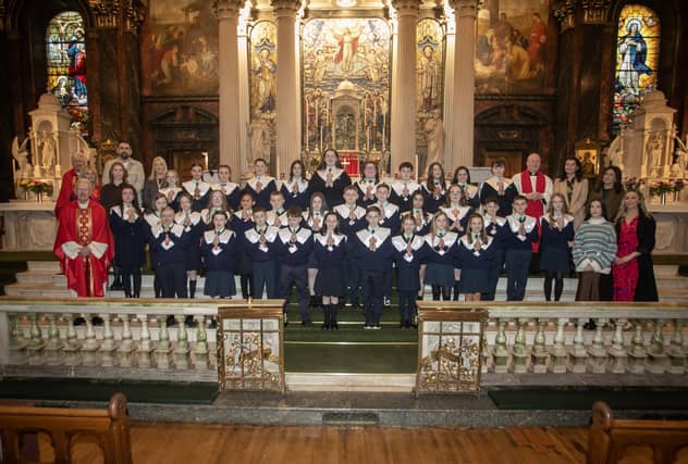 LONG TOWER PS CONFIRMATION. . . . . .Pupils from Long Tower Primary School, who received the Sacrament of Confirmation from Fr. Declan Boland at St. Columba's Church, Long Tower on Friday last.. (Photo: Jim McCafferty Photography)