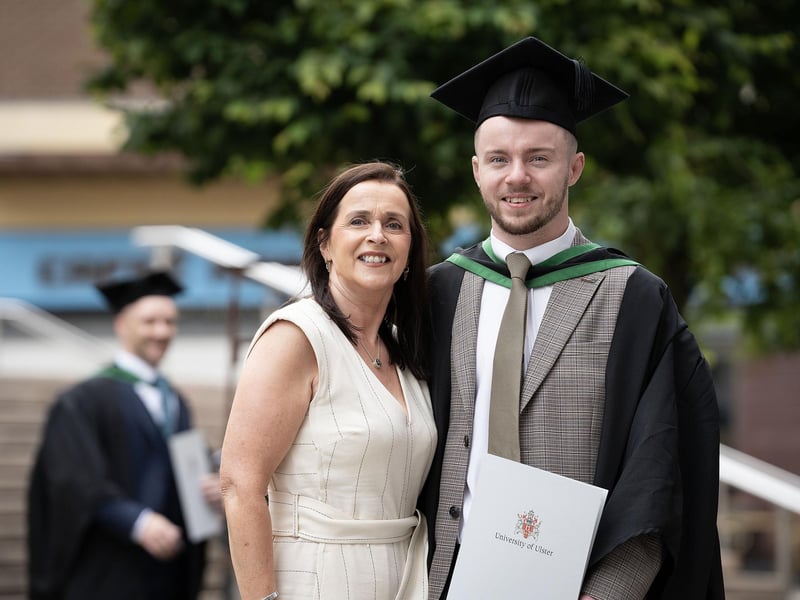 Matthew Mulligan, Computer Science graduate from Derry celebrates with mum Claire Mulligan as he graduates from Ulster University in Derry on Monday July 8. (Photo: Nigel McDowell / Ulster University)