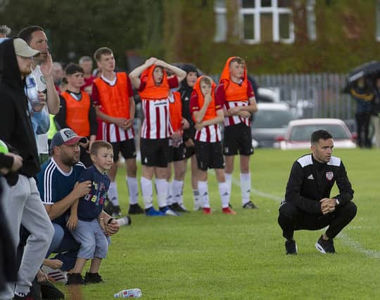 Derry City Academy coach Neil McCafferty is on his knees watching his side during the Foyle Cup. Pictures by Martin Coyle/The Jungle View Boys