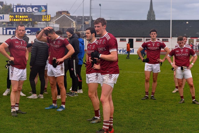 Dejected Slaughtneil players after their SFC final defeat by Glen in Celtic Park, on Sunday afternoon.  DER2243GS – 020