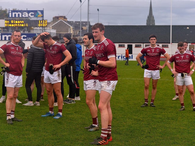 Dejected Slaughtneil players after their SFC final defeat by Glen in Celtic Park, on Sunday afternoon.  DER2243GS – 020