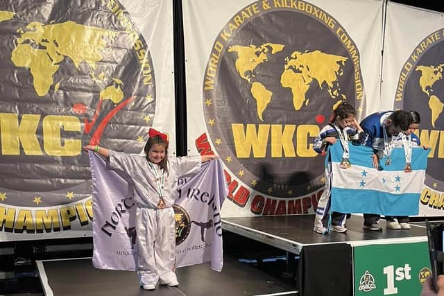MIckey Finn's member Banaz Ali celebrates her bronze medal at the WKC World Championships in Killarney last week.